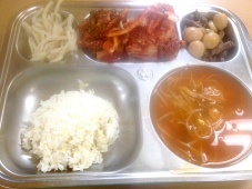 Shredded potatoes, tentacle salad, kimchi, quail eggs with beef, tofu/bean sprout/kimchi water soup, ice.