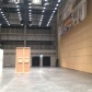 One third of the massive theatre hall, currently being set up for an exhibit/festival. Literally one third since it's divided by retracting walls.